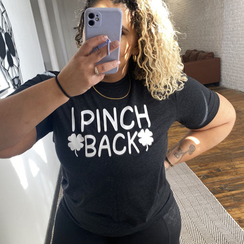 black unisex shirt with the saying "i pinch back" on it in white