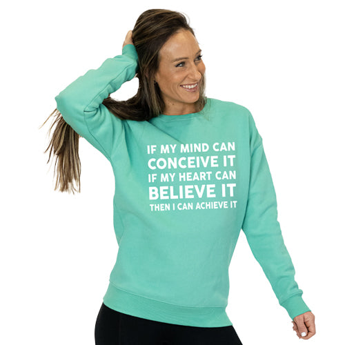 front view of spearmint crew neck with saying "if my mind can conceive it if my heart can believe it then i can achieve it" in white