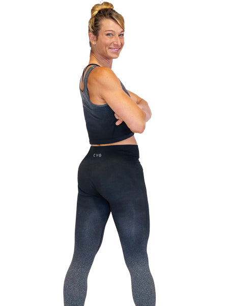 Photo of ninja warrior, Jessie Graff, wearing black ombre leggings and the matching black ombre crop top
