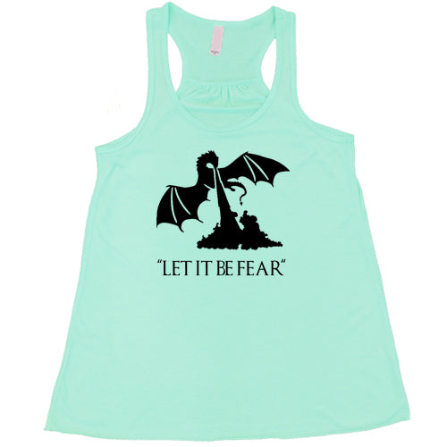 mint racerback shirt with a white dragon graphic and the saying "Let It Be Fear" on it in black