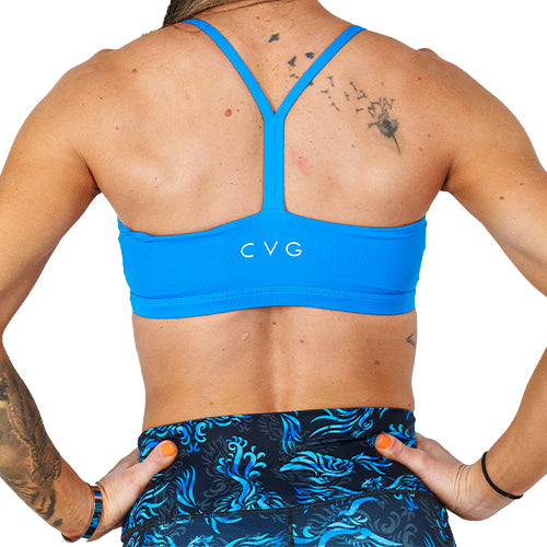 back view of solid bright blue sports bra