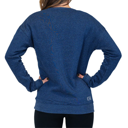 Photo of the back of a model wearing a basic navy crewneck