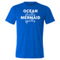blue unisex tee with the saying "ocean shells mermaid spells" in white in the center