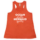 coral racerback tank with the saying "ocean shells mermaid spells" in white in the center