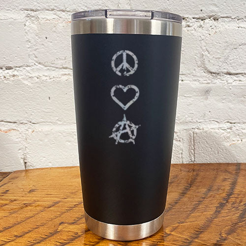 silver peace sign, heart and anarchy symbol on a black 20oz tumbler