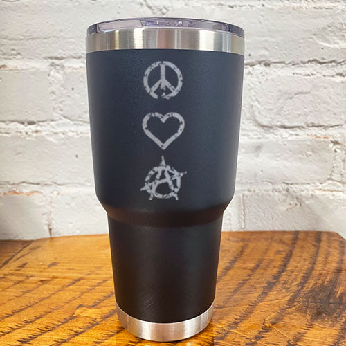 silver peace sign, heart and anarchy symbol on a black 30oz tumbler