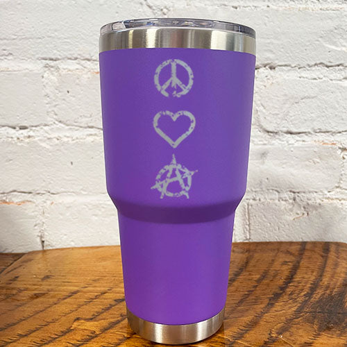 silver peace sign, heart and anarchy symbol on a purple 30oz tumbler