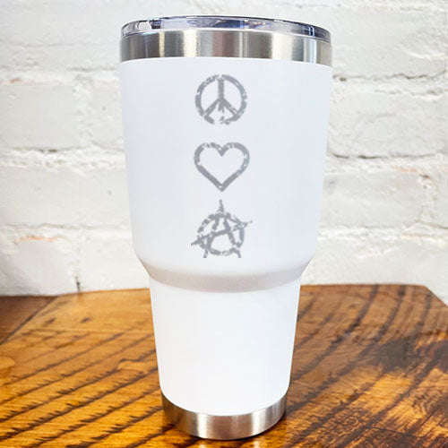 silver peace sign, heart and anarchy symbol on a white 30oz tumbler