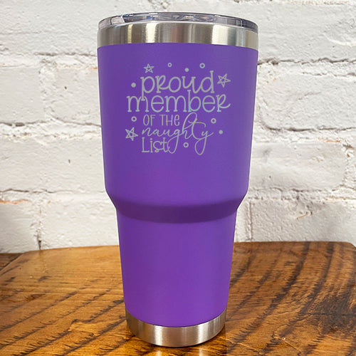 30oz purple tumbler with silver saying "proud member of the naughty list"