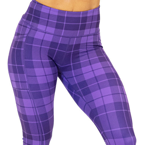 close up of purple plaid leggings