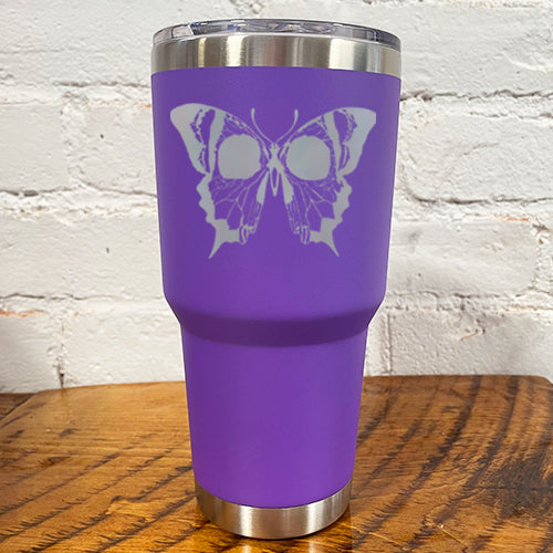 30oz purple tumbler with silver skull butterfly in the center