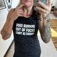 Image of black marble muscle tank with the saying "Does running out of fucks count as cardio" on it