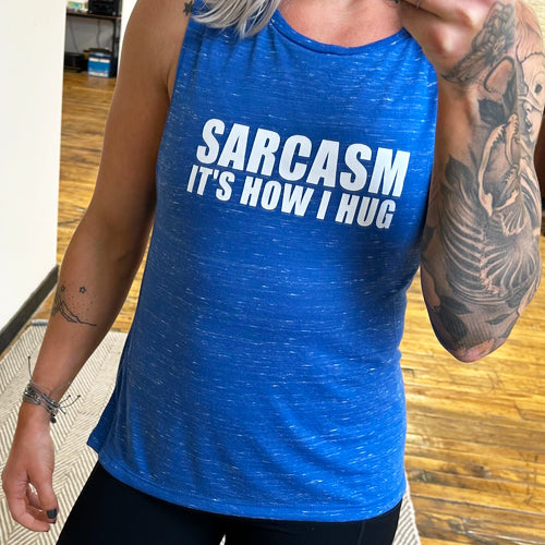 Blue muscle tank with the saying "sarcasm it's how I hug" on it
