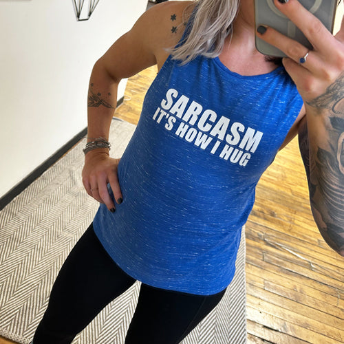 Blue muscle tank with the saying "sarcasm it's how I hug" on it