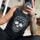 Black marble muscle tank with a geometric skull graphic
