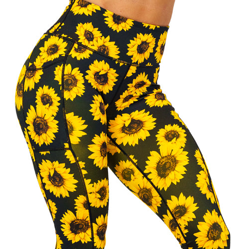 close up of sunflower print leggings 