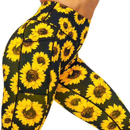 close up of sunflower print leggings