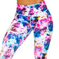 close up of pink, blue, yellow and white tie dye print leggings 