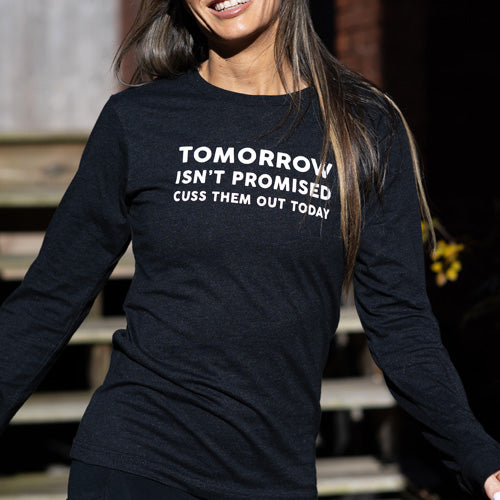 front view of heather black colored long sleeve shirt with saying in the color white