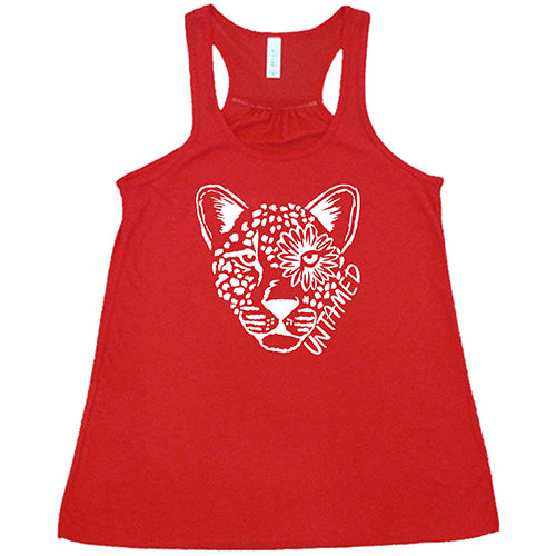 red tank top with tiger head design saying untamed on it