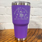  30oz purple tumbler with silver saying "when you're dead inside but it's christmas" with a santa hat skeleton holding ornaments